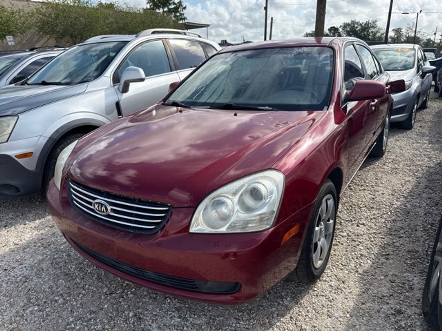 Red 2008 Kia Optima LX Sedan Front-Wheel Drive Automatic