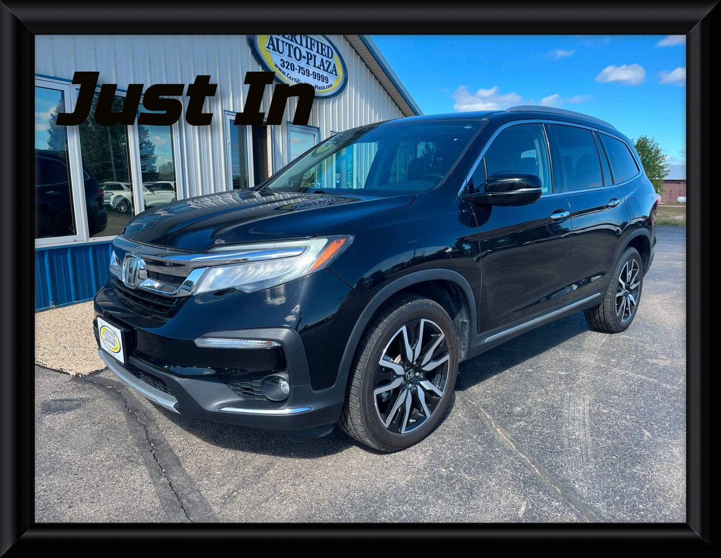 2019 Honda Pilot Touring AWD with Rear Captain's Chairs