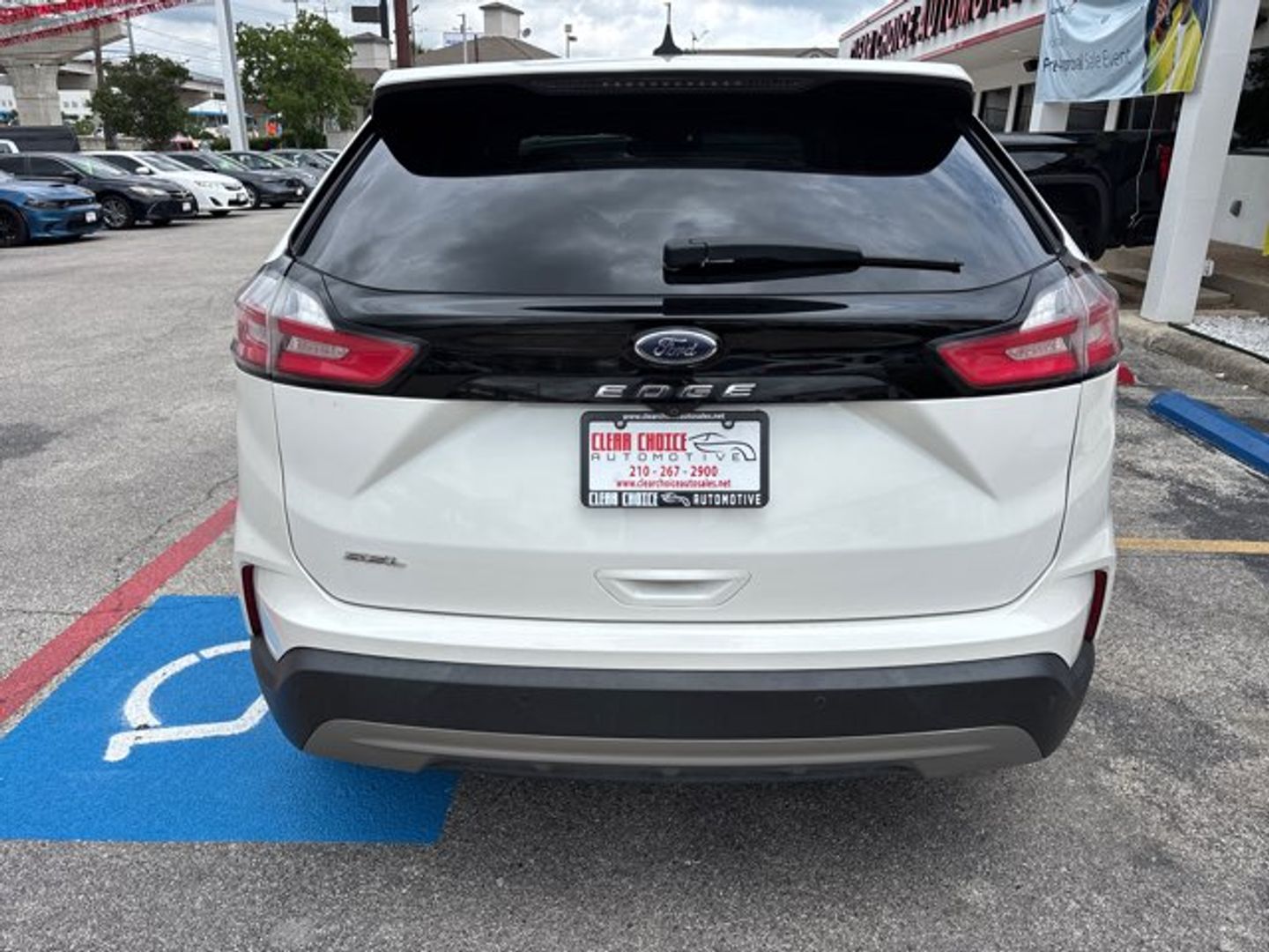 View vehicle photo 4